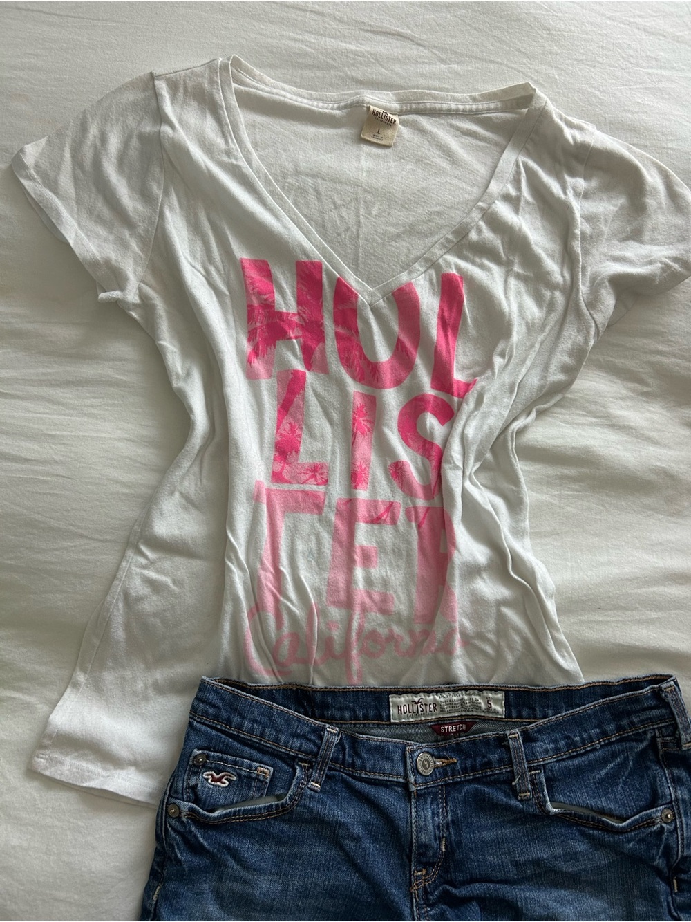 Hollister White V-Neck Graphic Tee with Pink Lettering